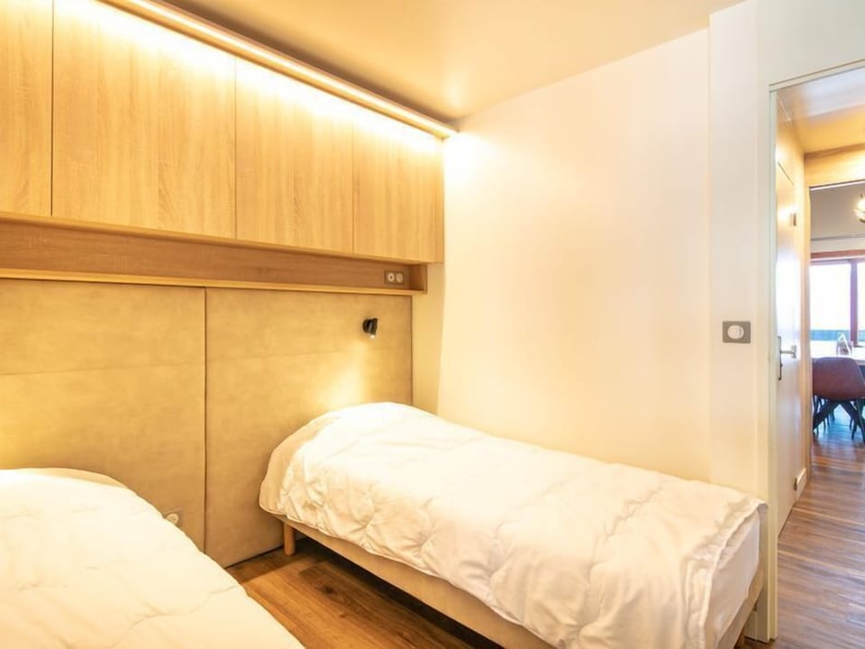 Relax on the comfy bed after a day outside.