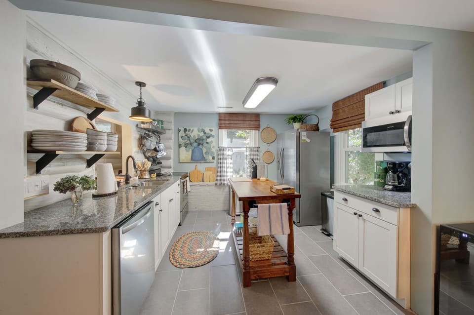 Beautiful fully stocked kitchen w/ plenty of room to cook at home!