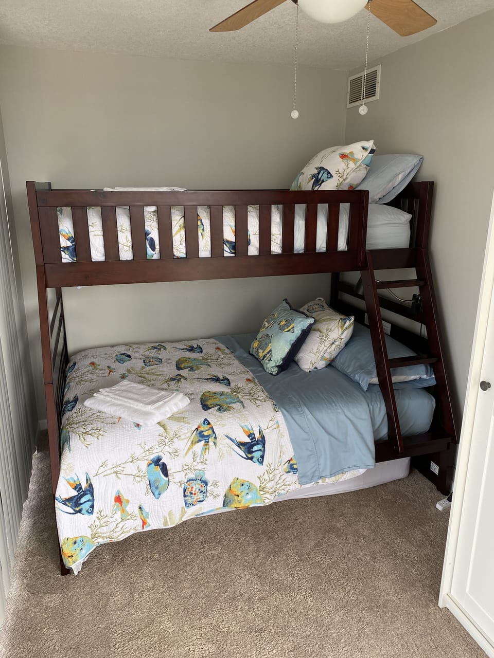 Guest room with bunk beds (twin and full) and twin trundle. 