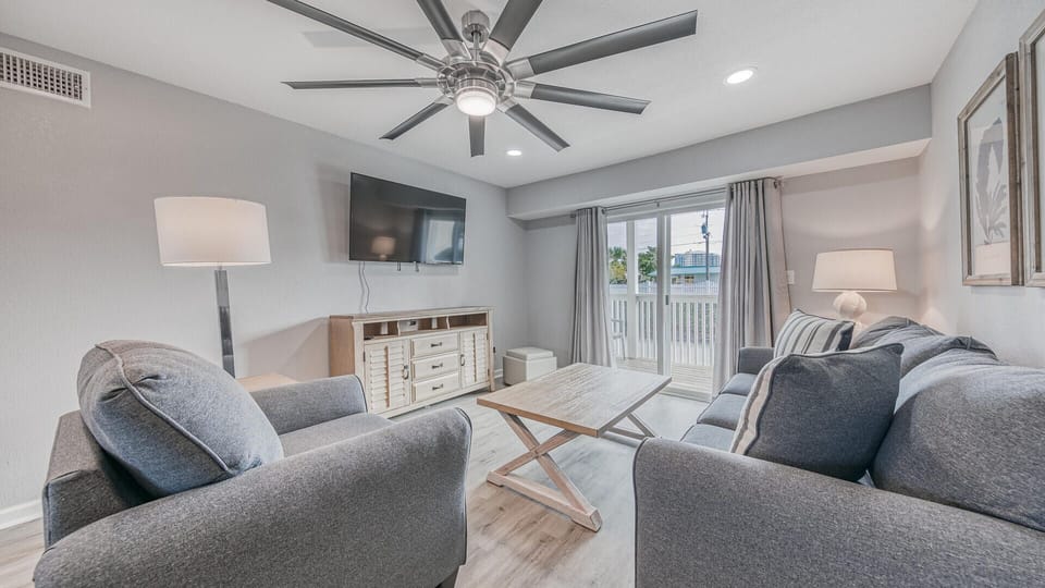 Comfortable Living Room With Mounted TV