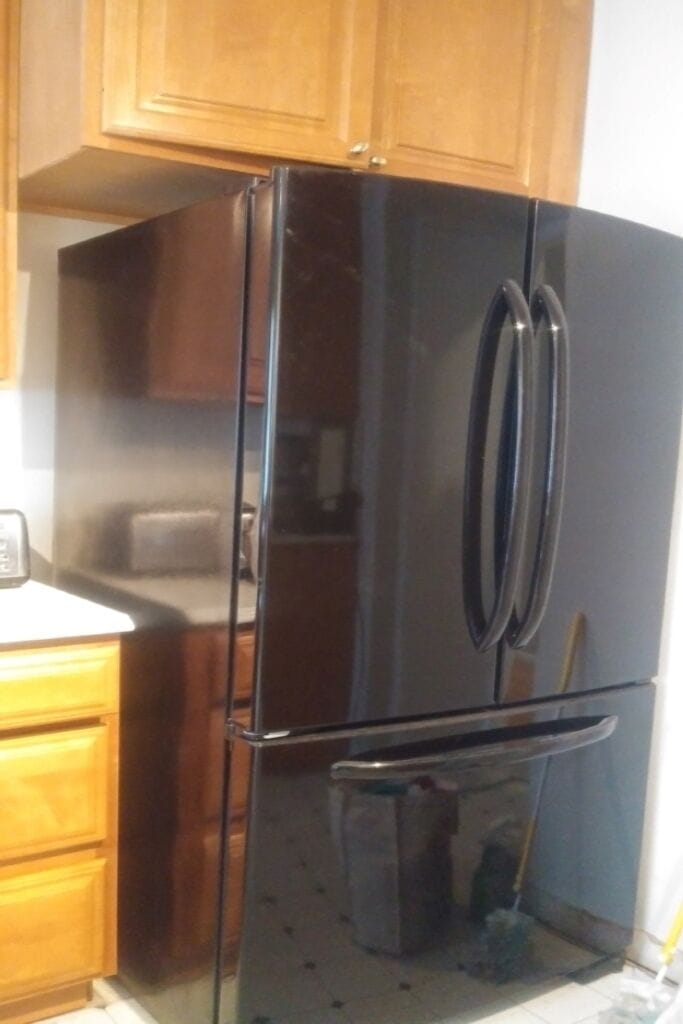 Refrigerator with ice maker.
