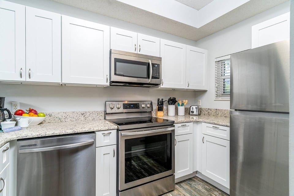 Well Equipped Kitchen with New Stainless Steel Appliances