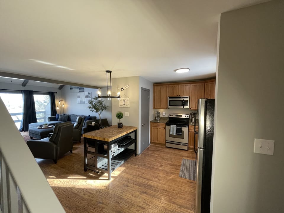 First floor from bottom of stairs to loft. 
