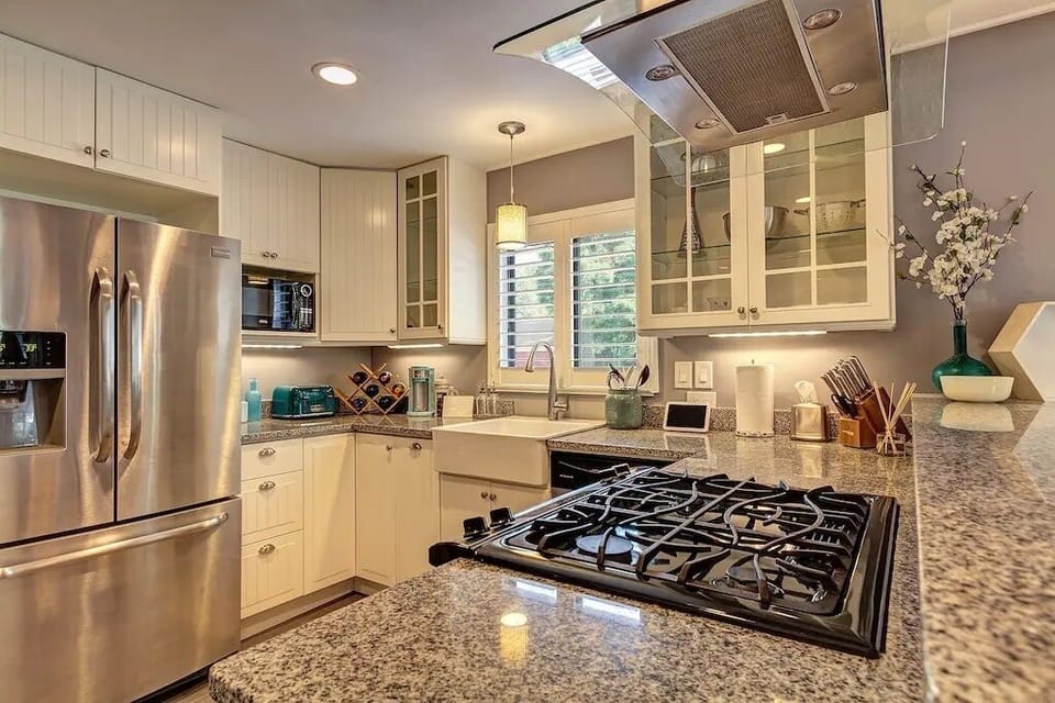 Sunny, welcoming kitchen equipped with everything you will need. It's a clean, cheerful space that is fully stocked for our guests.