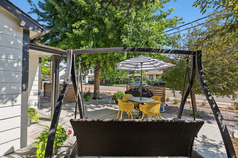 Swing — The front porch offers a table and seating area as well as a glider swing to enjoy. ☺️