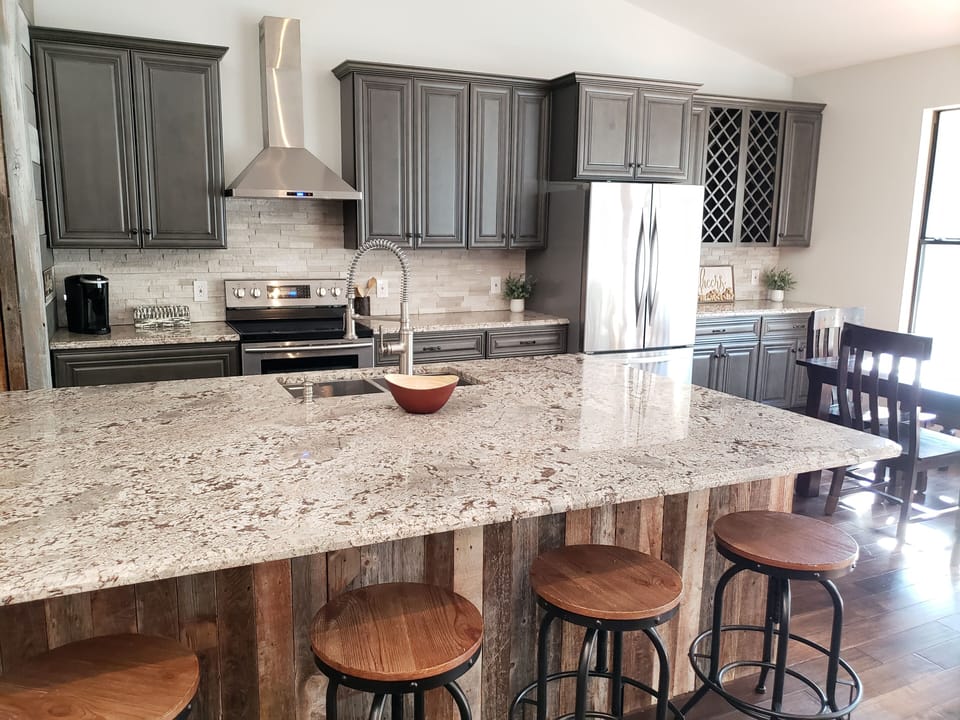 Large kitchen island and superb appliances makes this a great kitchen! 
