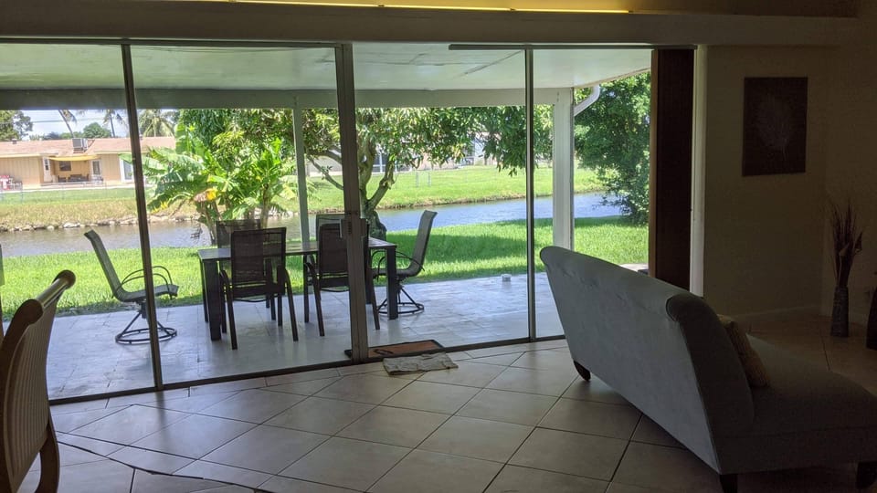Living room to the patio and backyard view