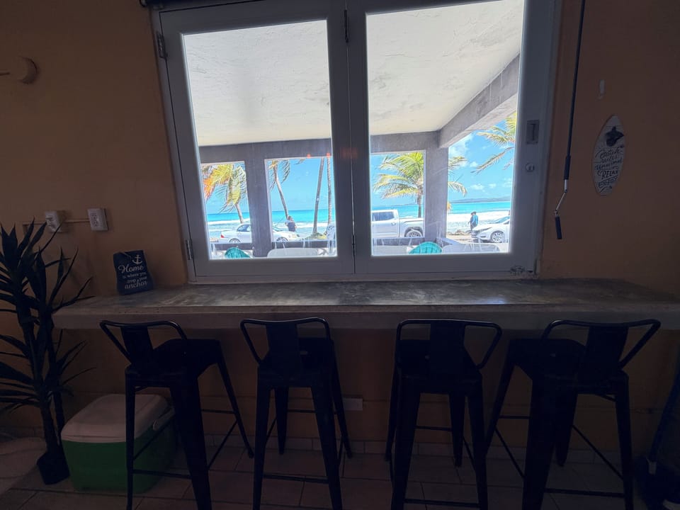 Watch the surfers while you cook