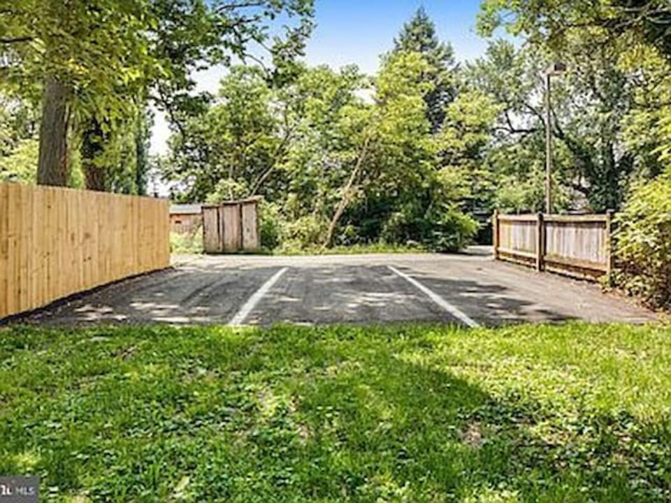 PARKING - rear of house. 1 space, but you can park 2 deep with one on the grass