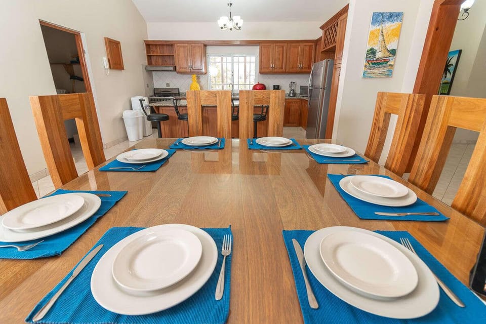 Dining Room: Gather around the elegant table for unforgettable meals with friends and family!
