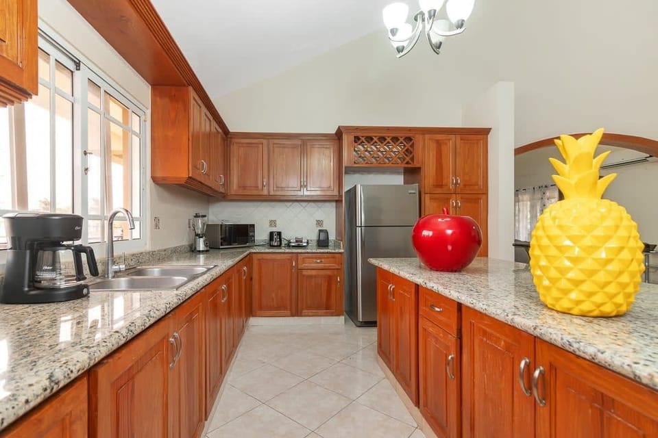 Gourmet Kitchen: Whip up culinary delights in this stylish space adorned with vibrant decor!  Ask about our Private Chef Services!