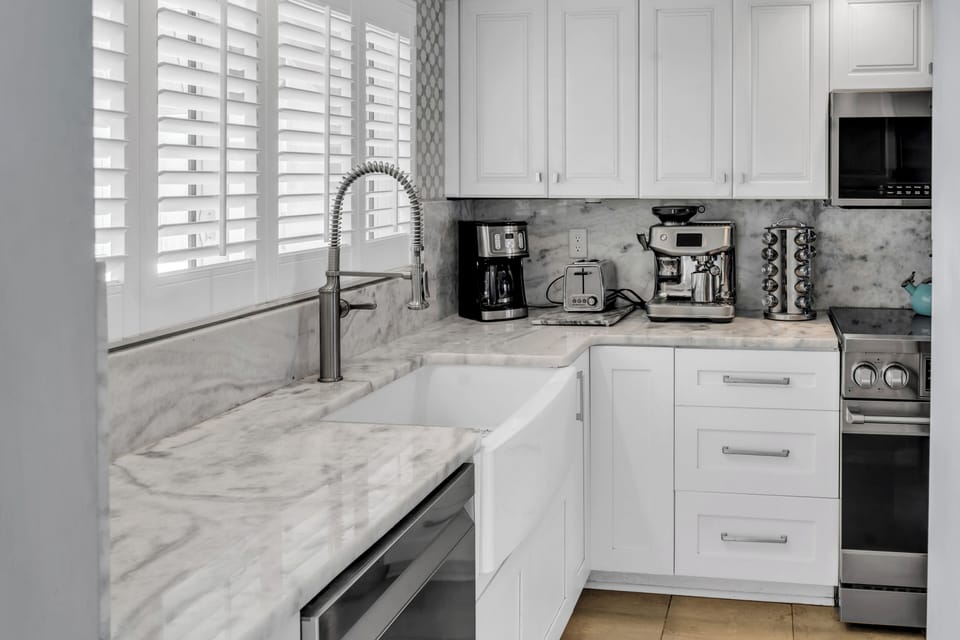 Designer kitchen with Imported Italian Marble tops,  Thor Stove