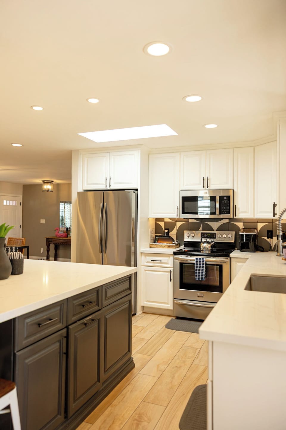Fully equipped kitchen with island seating and coffee station
