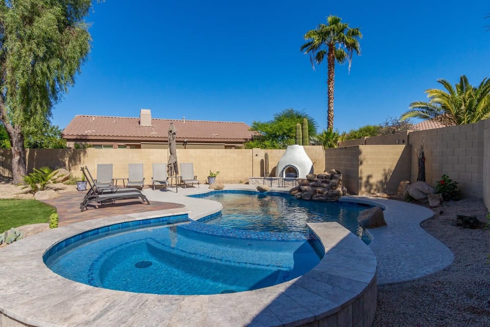Large Spa with spillway waterfall feature