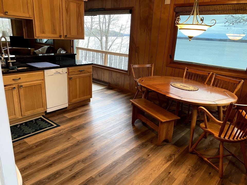 Lakeside view from the main level kitchen and dining area!