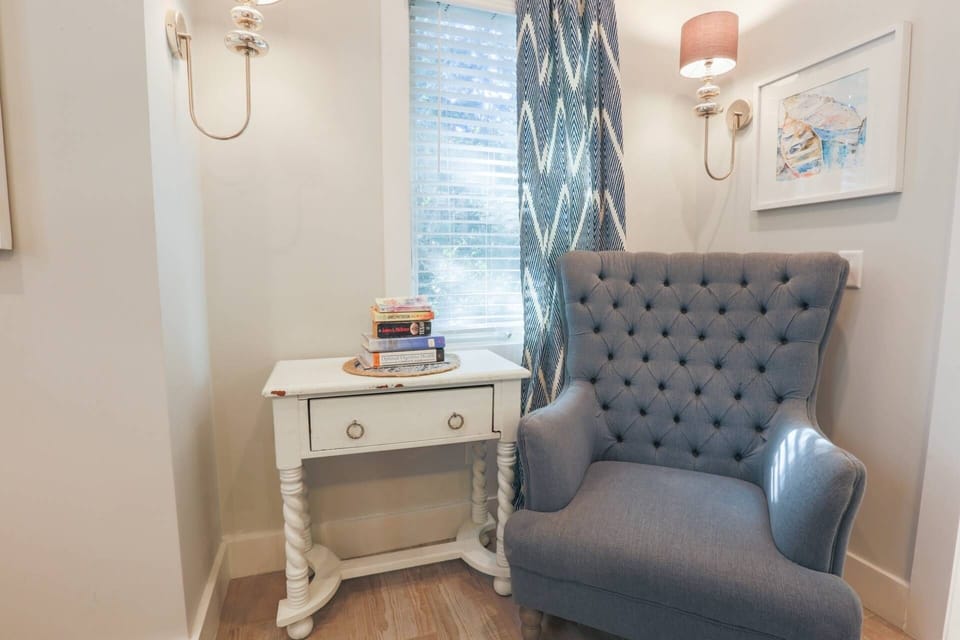 This comfortable seating area is tucked away in the corner of the master suite.