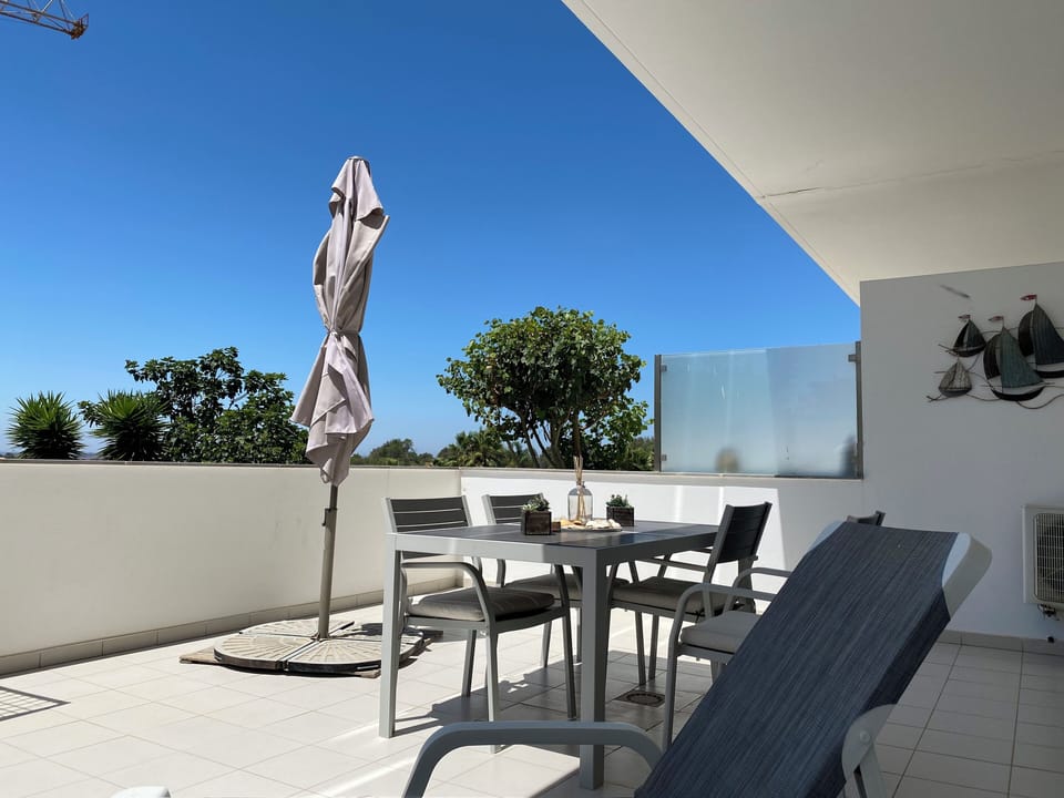 Extensive private terrace with direct access to pools and gardens