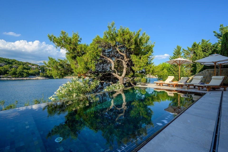 Outdoor heated pool in luxury Villa Prestige Brac with pool and gym by the sea
