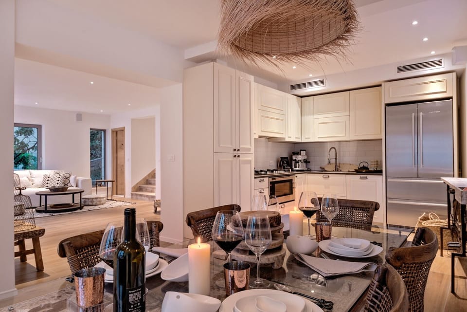 Richly decorated kitchen with living room in a luxury villa for rent and vacation Brač