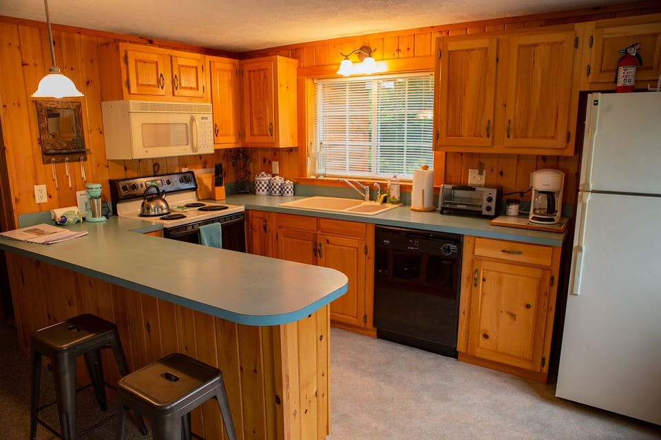 Kitchen with bar seating.