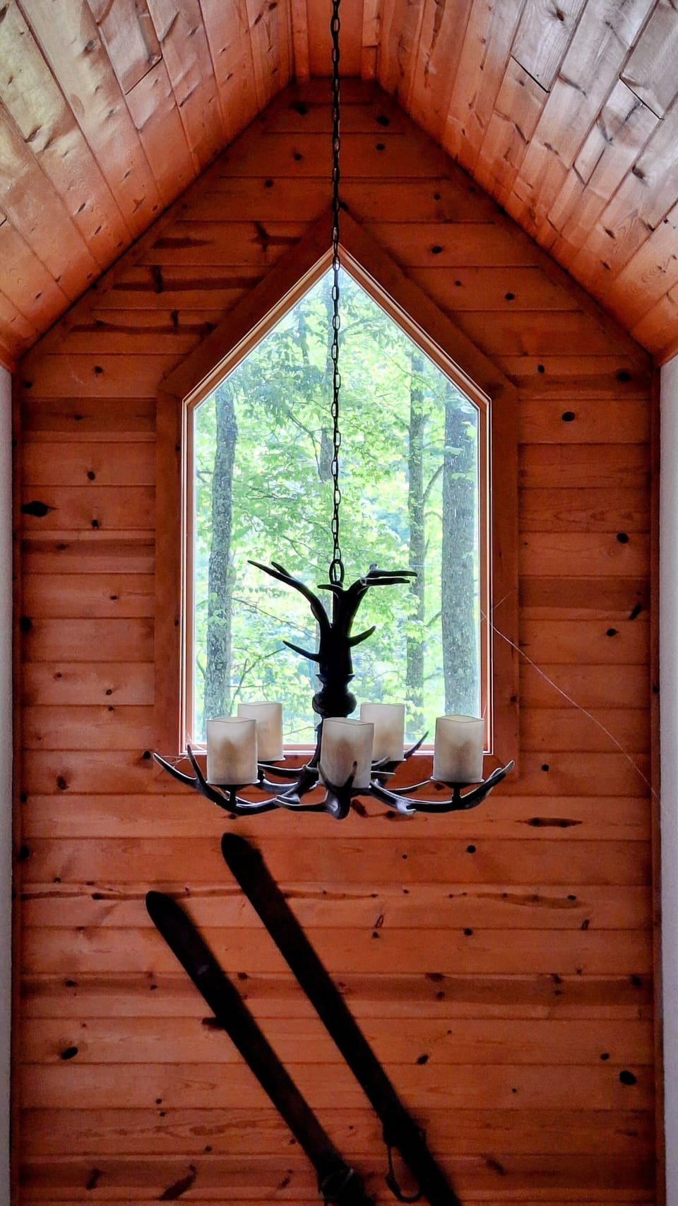 Cathedral window and chandelier