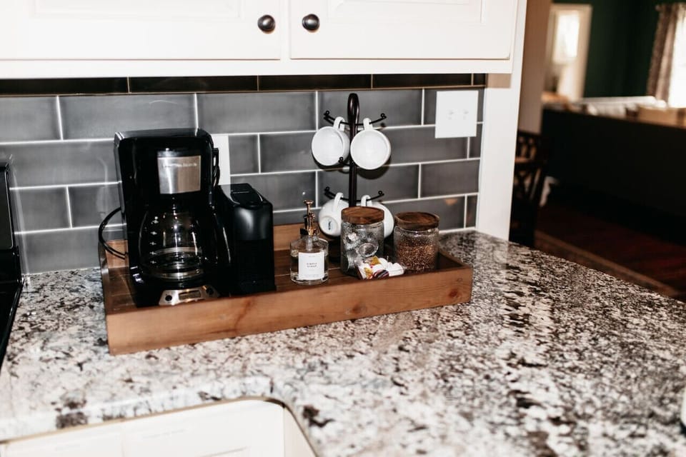 Coffee station with Nespresso, drip coffee maker, and locally roasted Yaggy Road Roasting Co.