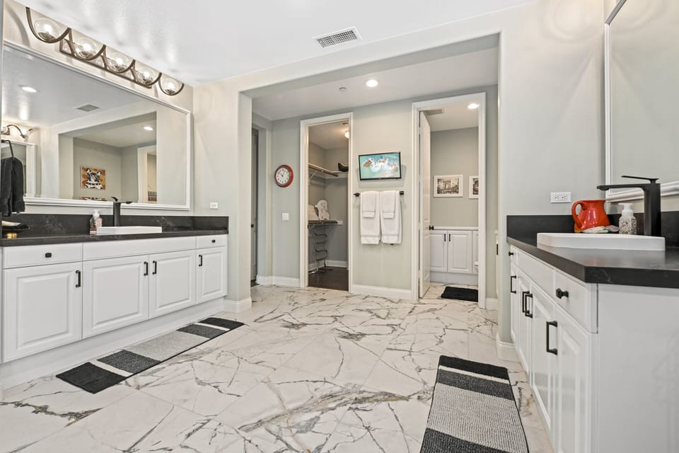 Double vanity offers plenty of space for both partners. 