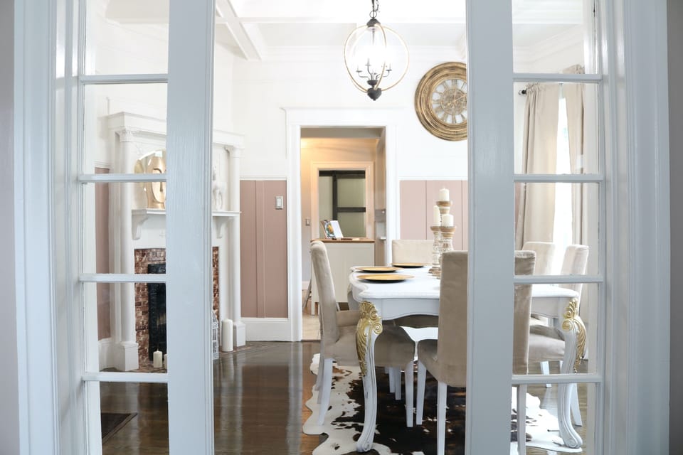 View from Living Room to Dining Room. Original 100+ year old details.