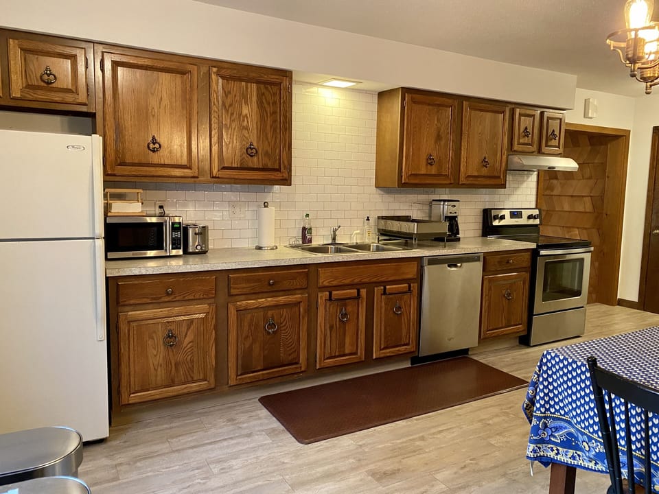 Fully stocked kitchen with Whirlpool appliances and pantry staples included