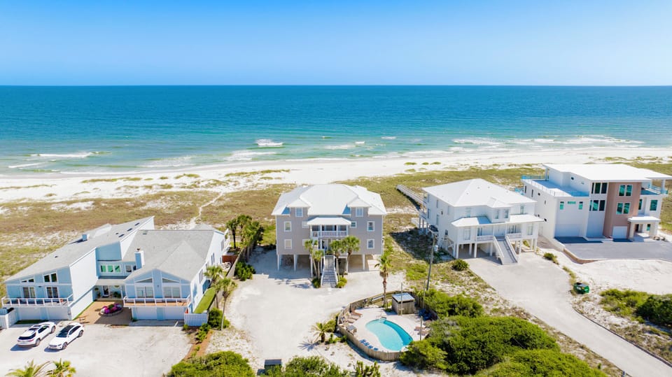 A direct beachfront, 12 bedroom, 10 bath duplex home