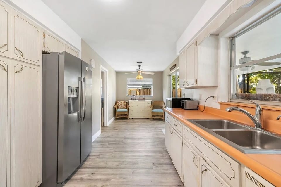 Kitchen with large side by side Ref. and Freezer - plenty of cabinet space