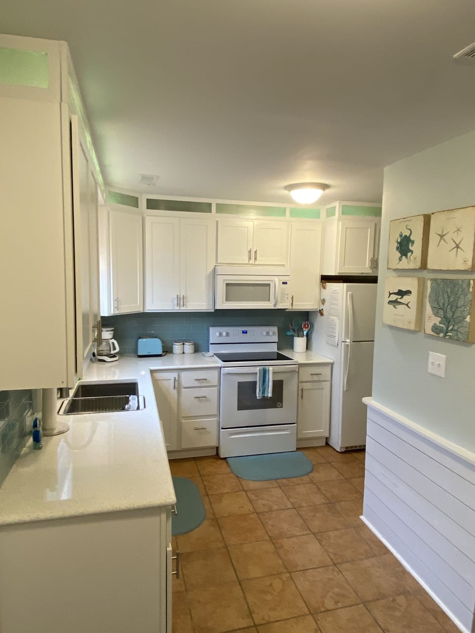 Newly renovated kitchen with washer and dryer