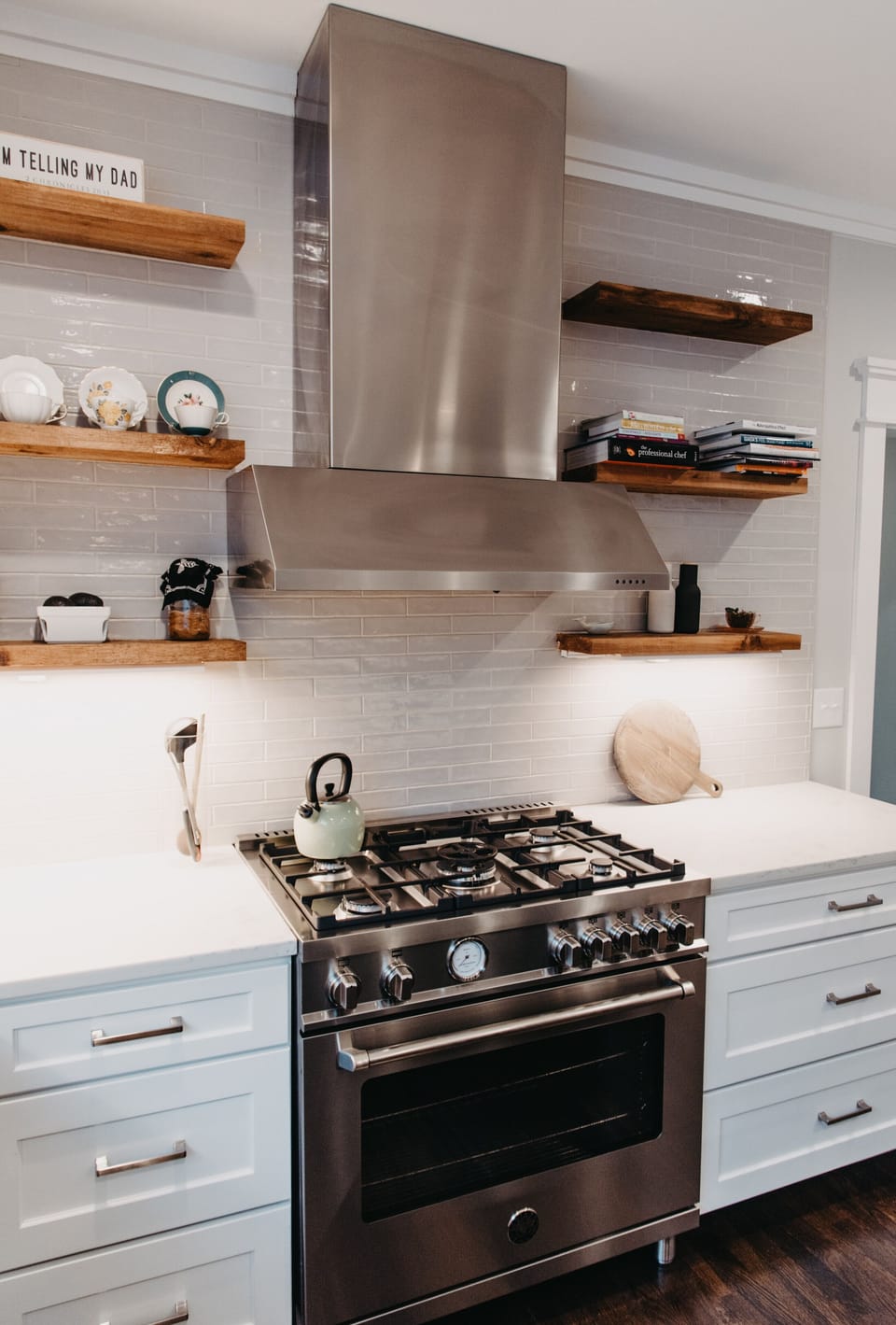 Kitchen with luxury Bertazzoni gas range, huge island with additional seating