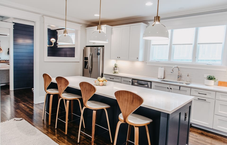 Kitchen with luxury Bertazzoni gas range, huge island with additional seating