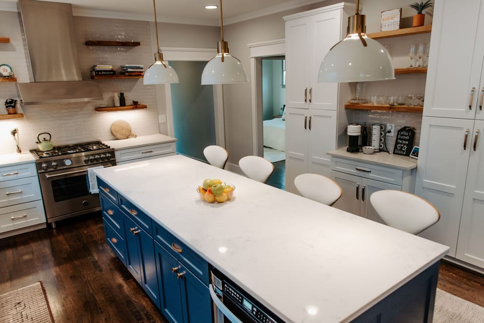 Kitchen with luxury Bertazzoni gas range, huge island with additional seating