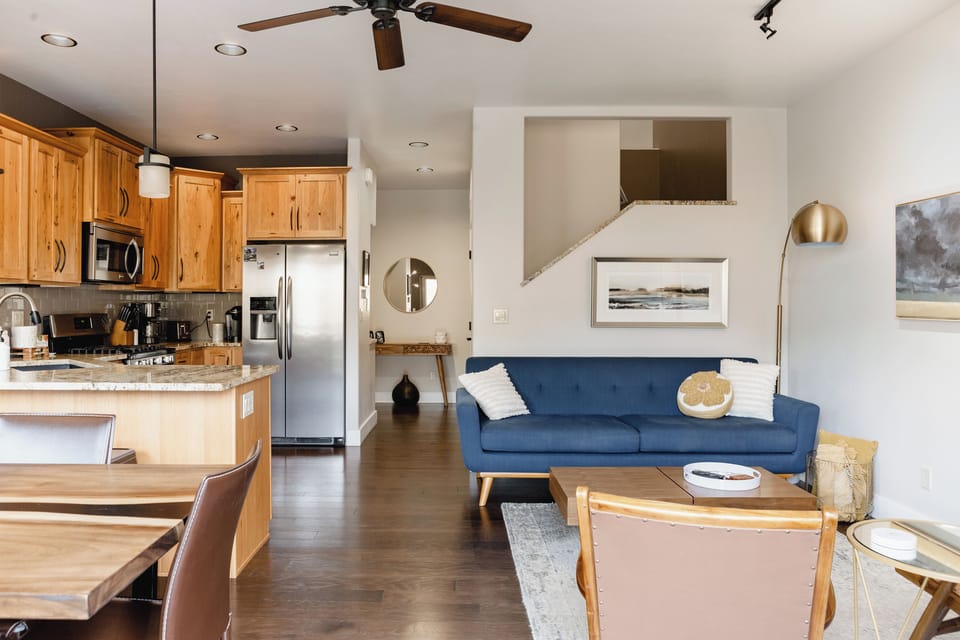 View of living, dining and kitchen area from river