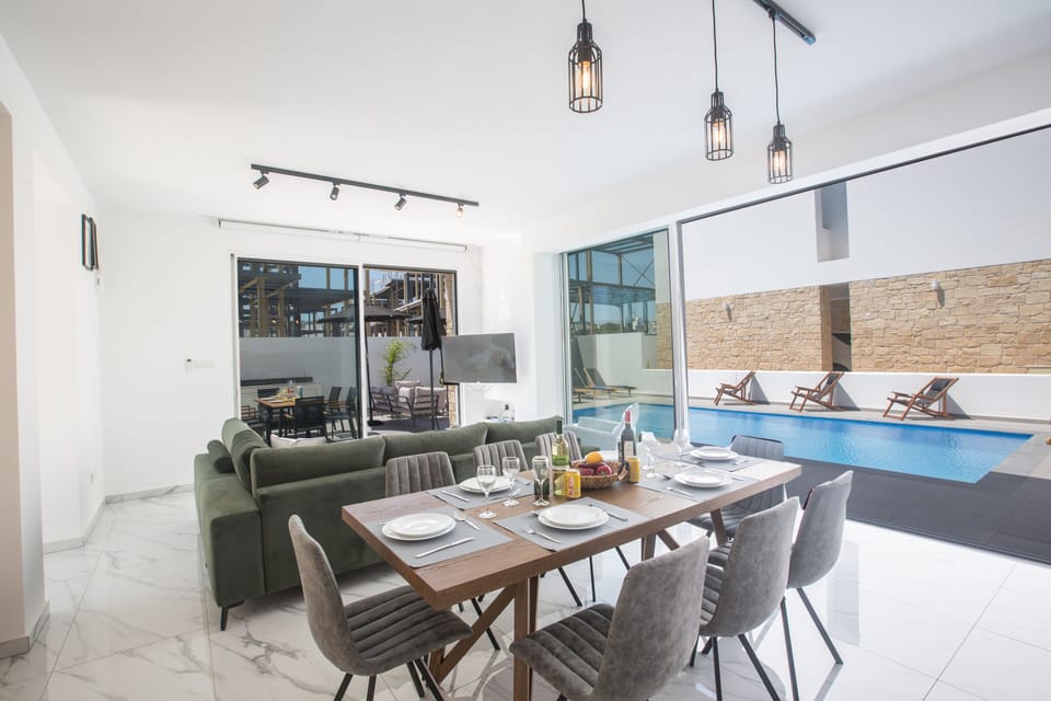 Dining area with table and chairs to seat 8 people