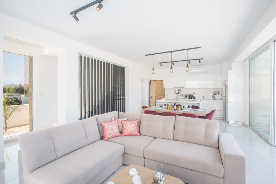 Living room with large, corner sofa