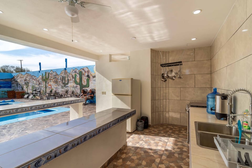 Poolside kitchen serves complimentary fresh hot coffee & baked goods each a.m.
