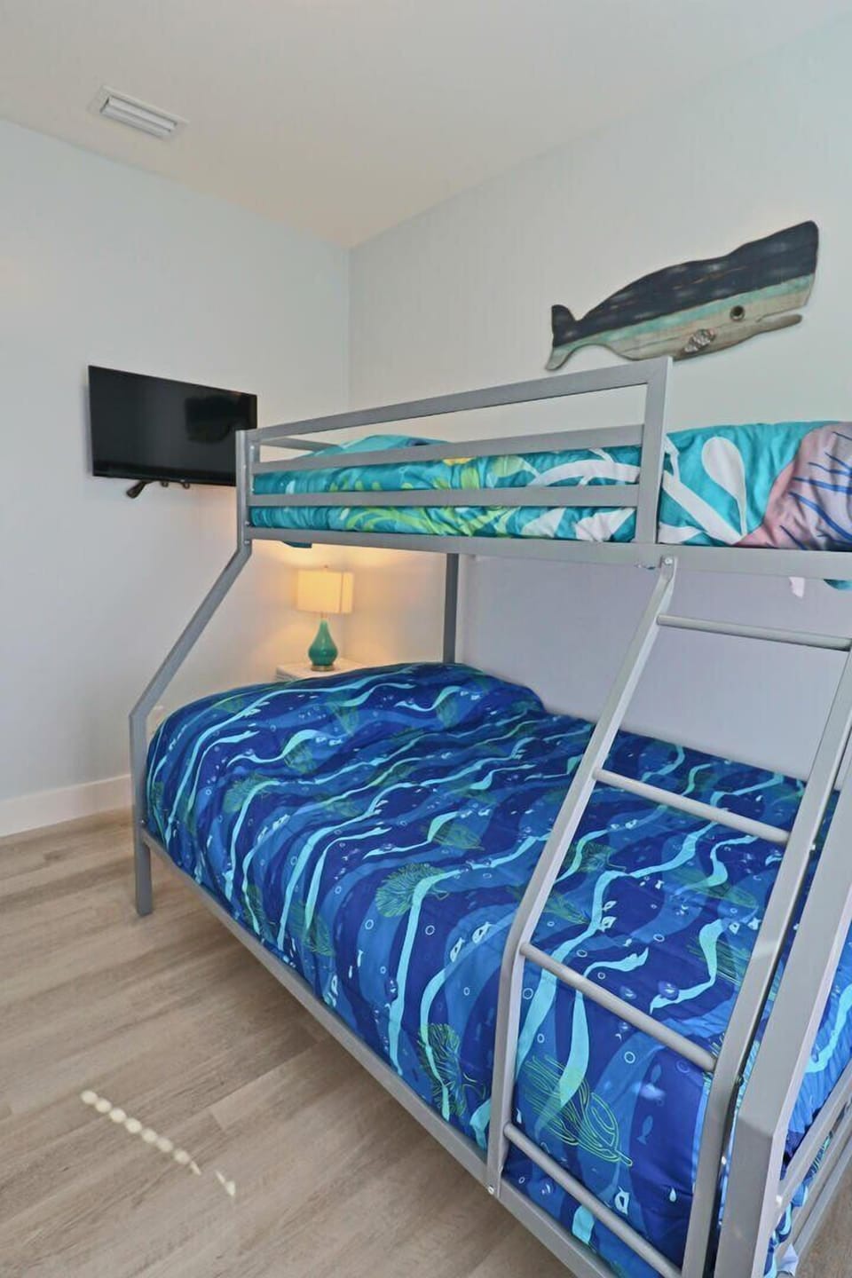 This bunk room offers a smart tv for entertaining.