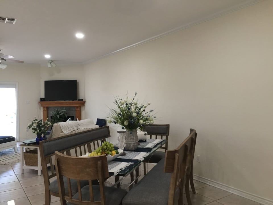 seating for 6 at the dining table for entertaining guests