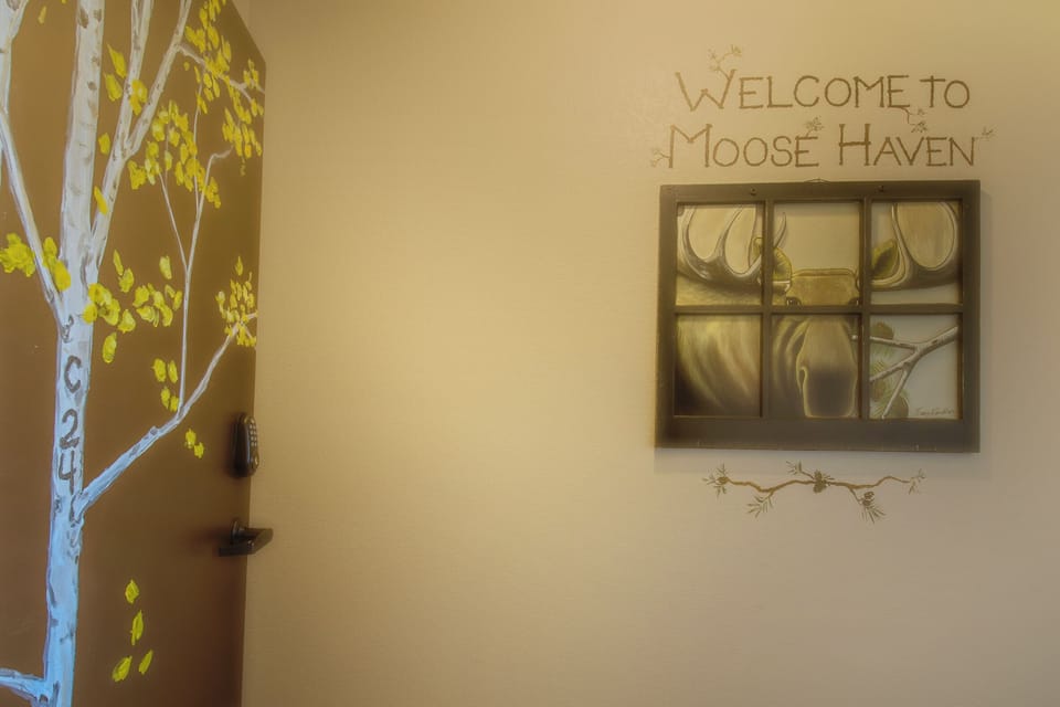 Step into your welcoming haven where rustic charm meets artistic flair, featuring hand-painted murals and thoughtful decor that makes you feel instantly at home.