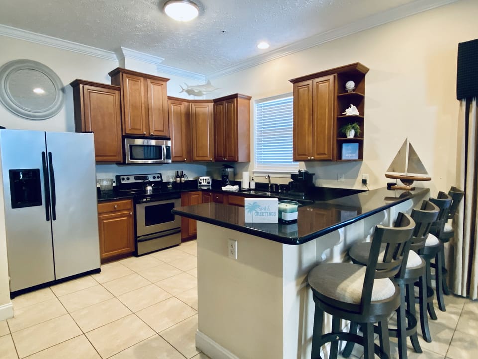 Large, well-equipped, kitchen.  The Keurig does both single pods and full pots.