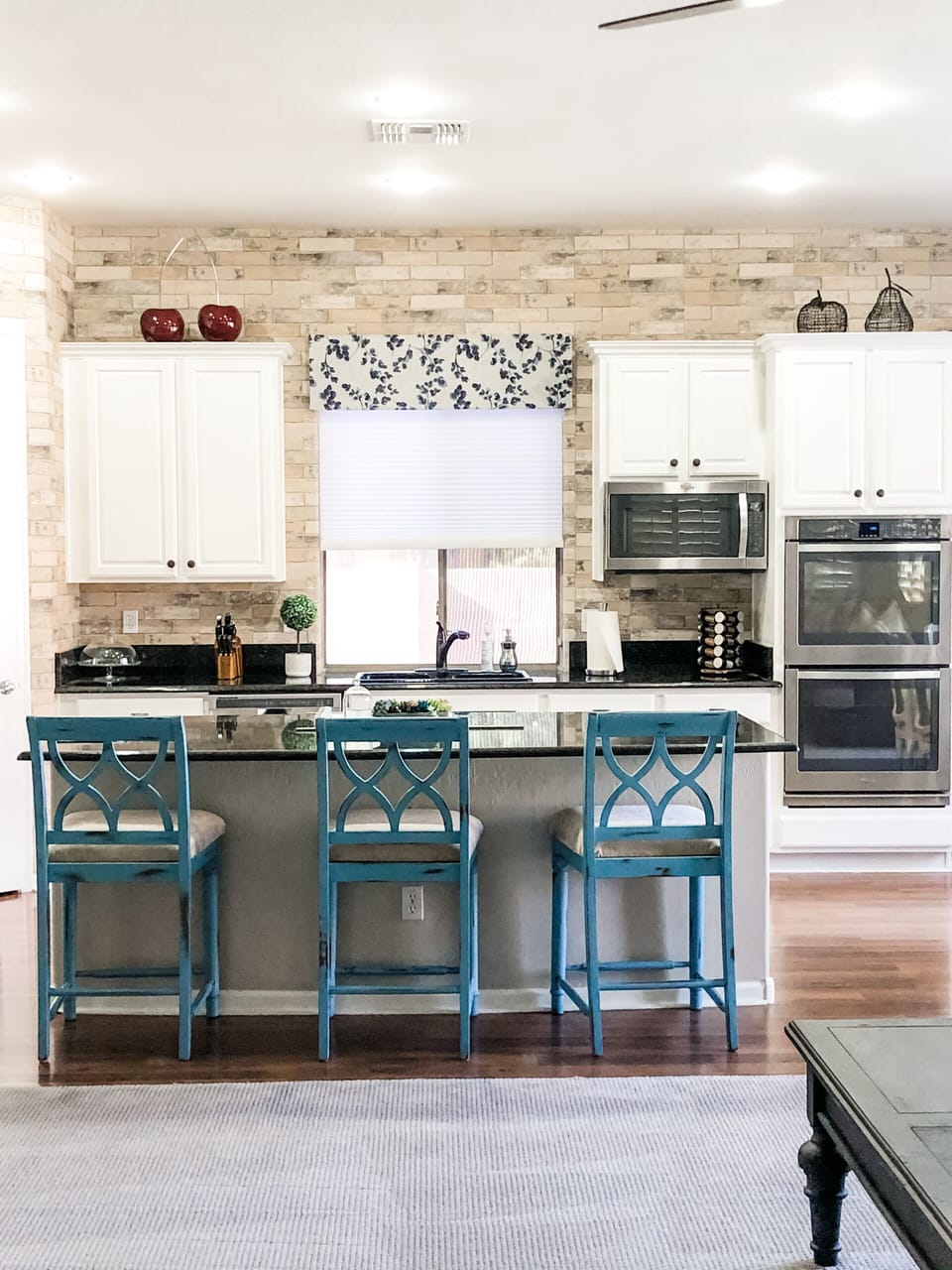 Spacious, immaculate kitchen with double ovens.