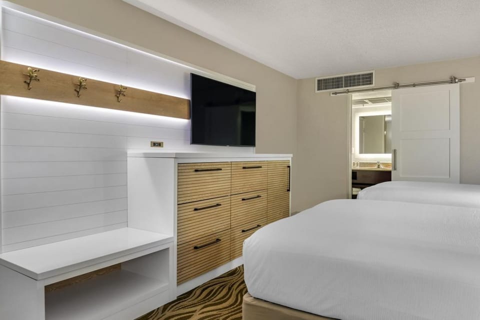 Enjoy movie nights with a large TV and sleek storage.