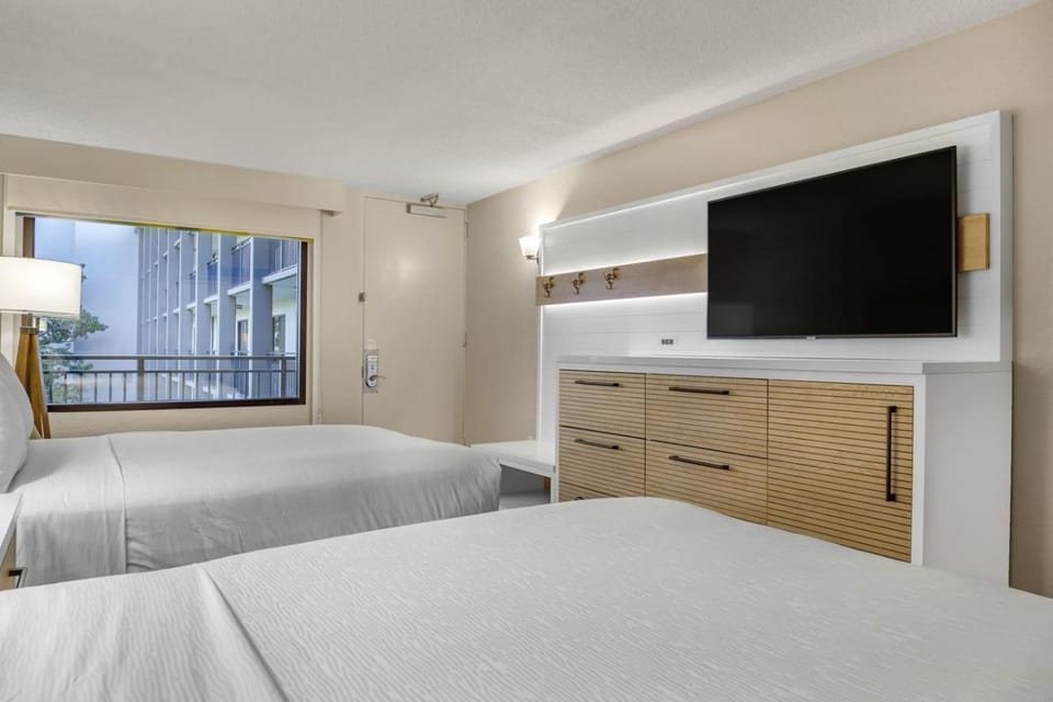 Lounge comfortably with easy views of the TV and window.