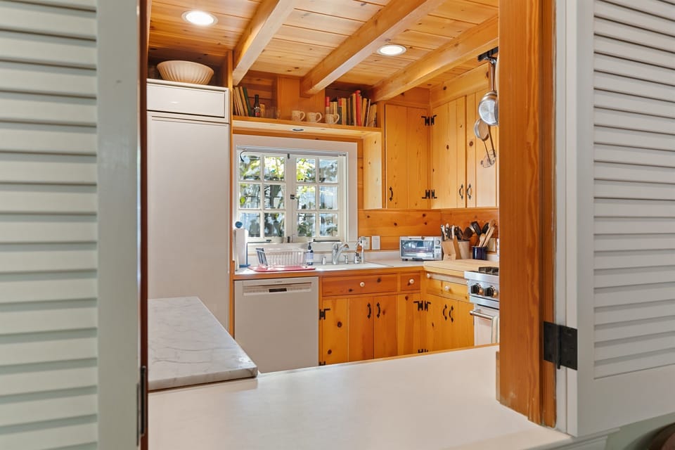 Kitchen includes a Viking gas range and large convection oven