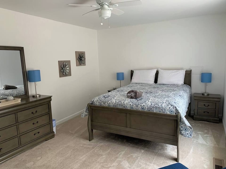 Queen BR with full bath. Bay window with view of lake.