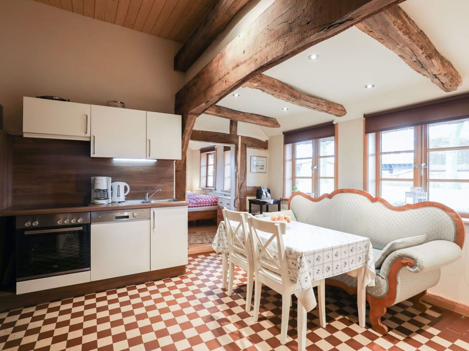 Furniture, Cabinetry, Window, Countertop, Kitchen Appliance, Wood, Couch, Interior Design, Kitchen Stove, Flooring