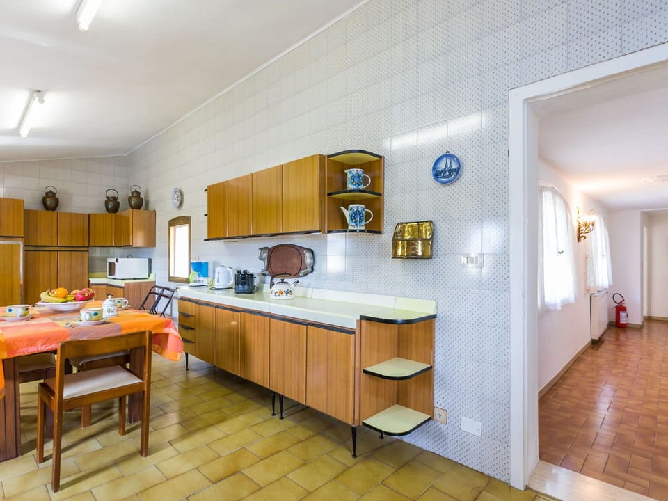 Furniture, Table, Cabinetry, Kitchen, Lighting, Wood, Interior Design, Floor, Flooring, Countertop